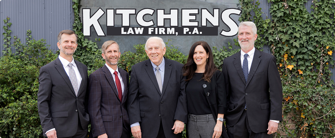 Kitchens Law Firm attorneys standing together outside office in Crystal Springs, MS